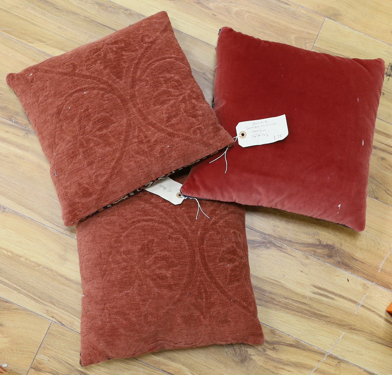 A pair of Soumac cushions, 14